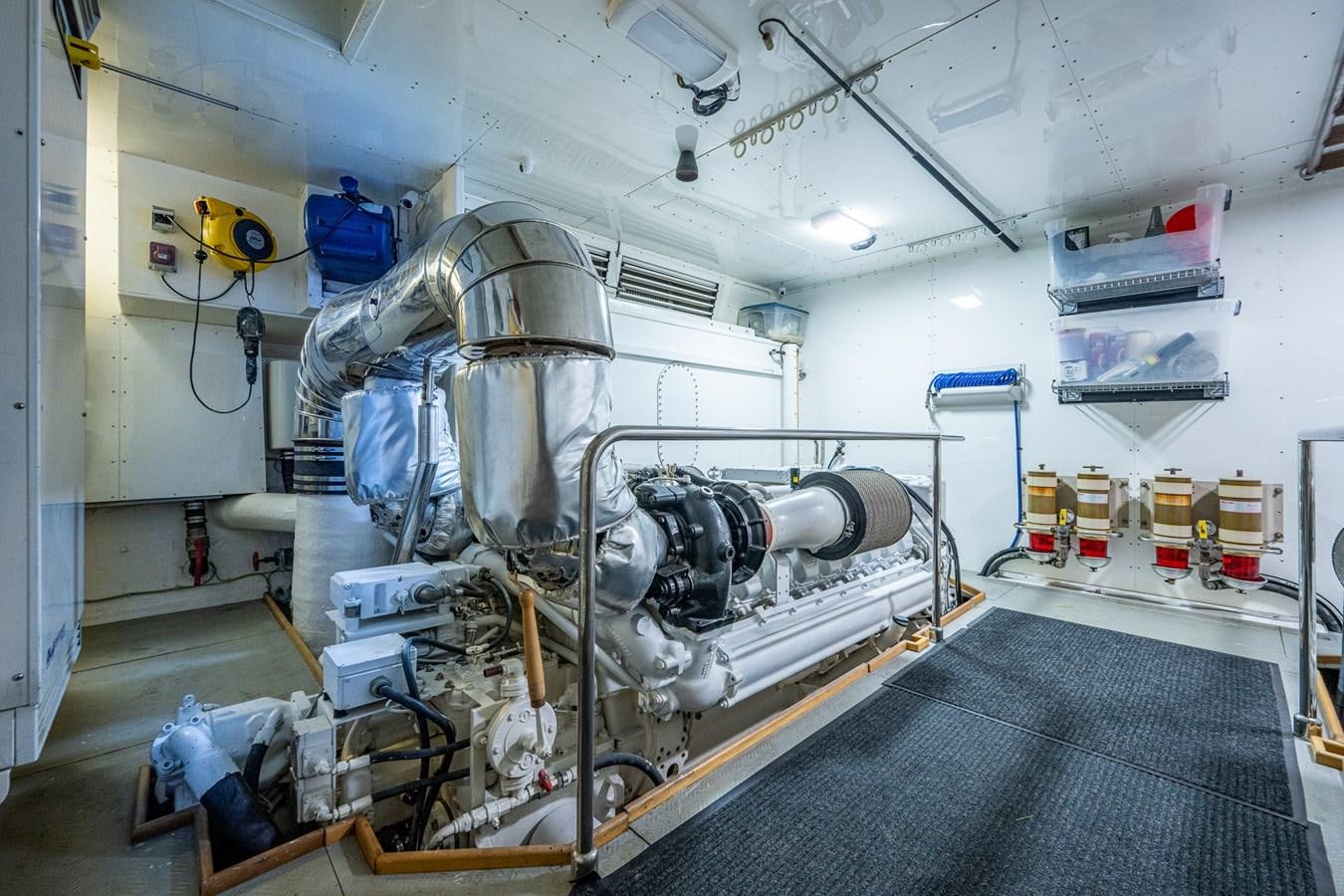 a large machine in a room aboard EVERYTHING GOOD Yacht for Sale