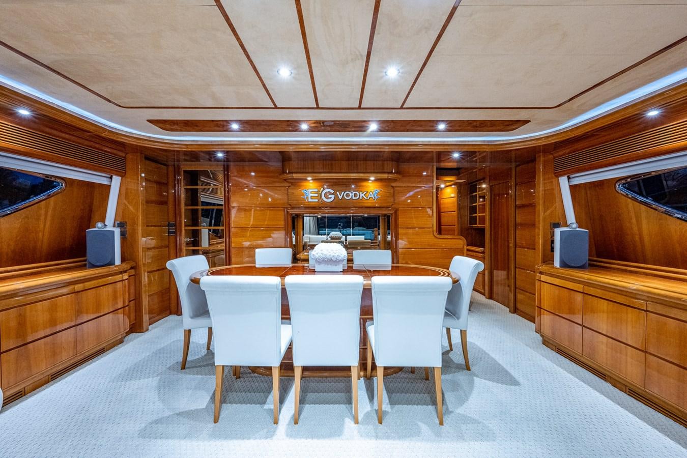 a room with a table and chairs aboard EVERYTHING GOOD Yacht for Sale