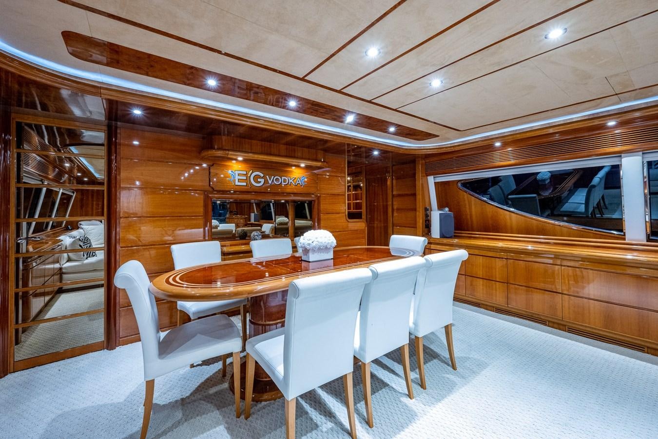 a table and chairs in a room aboard EVERYTHING GOOD Yacht for Sale