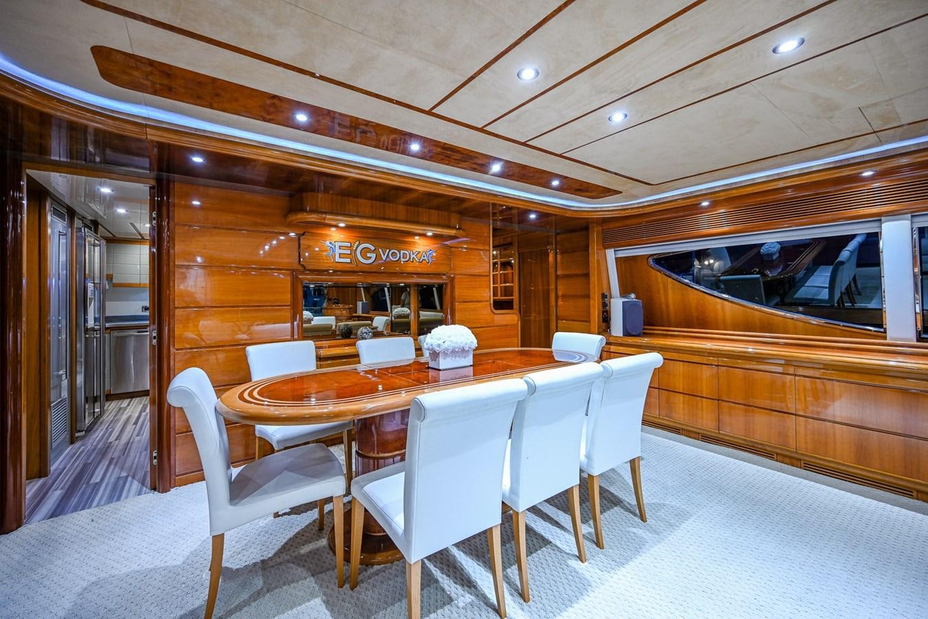 a table and chairs in a room aboard EVERYTHING GOOD Yacht for Sale