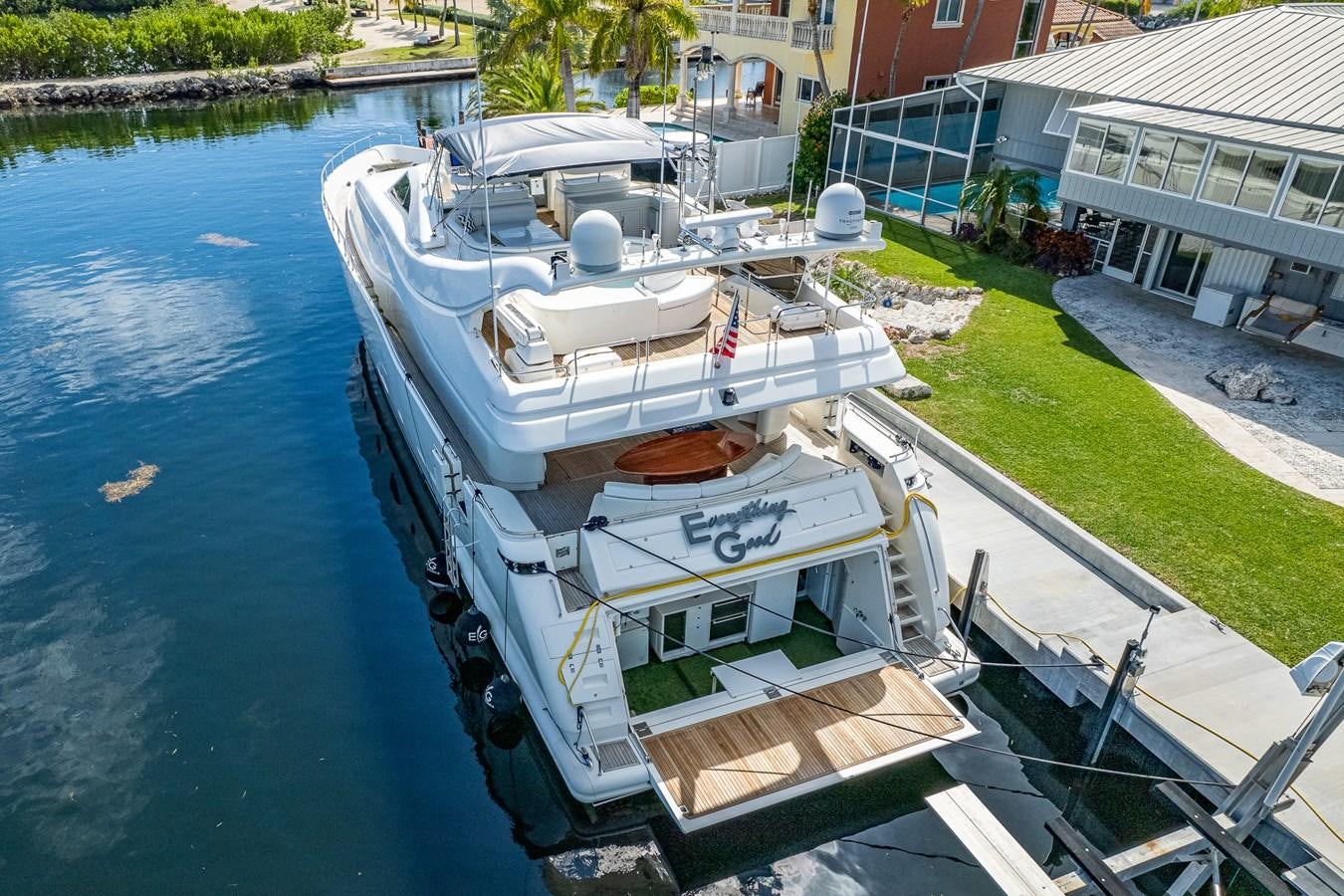 a boat docked at a pier aboard EVERYTHING GOOD Yacht for Sale
