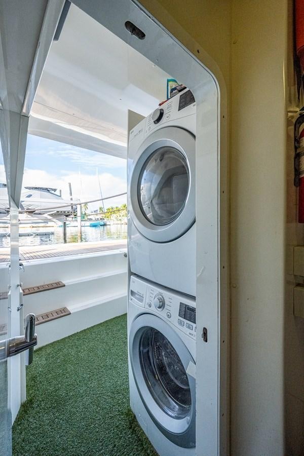 a white washing machine aboard EVERYTHING GOOD Yacht for Sale