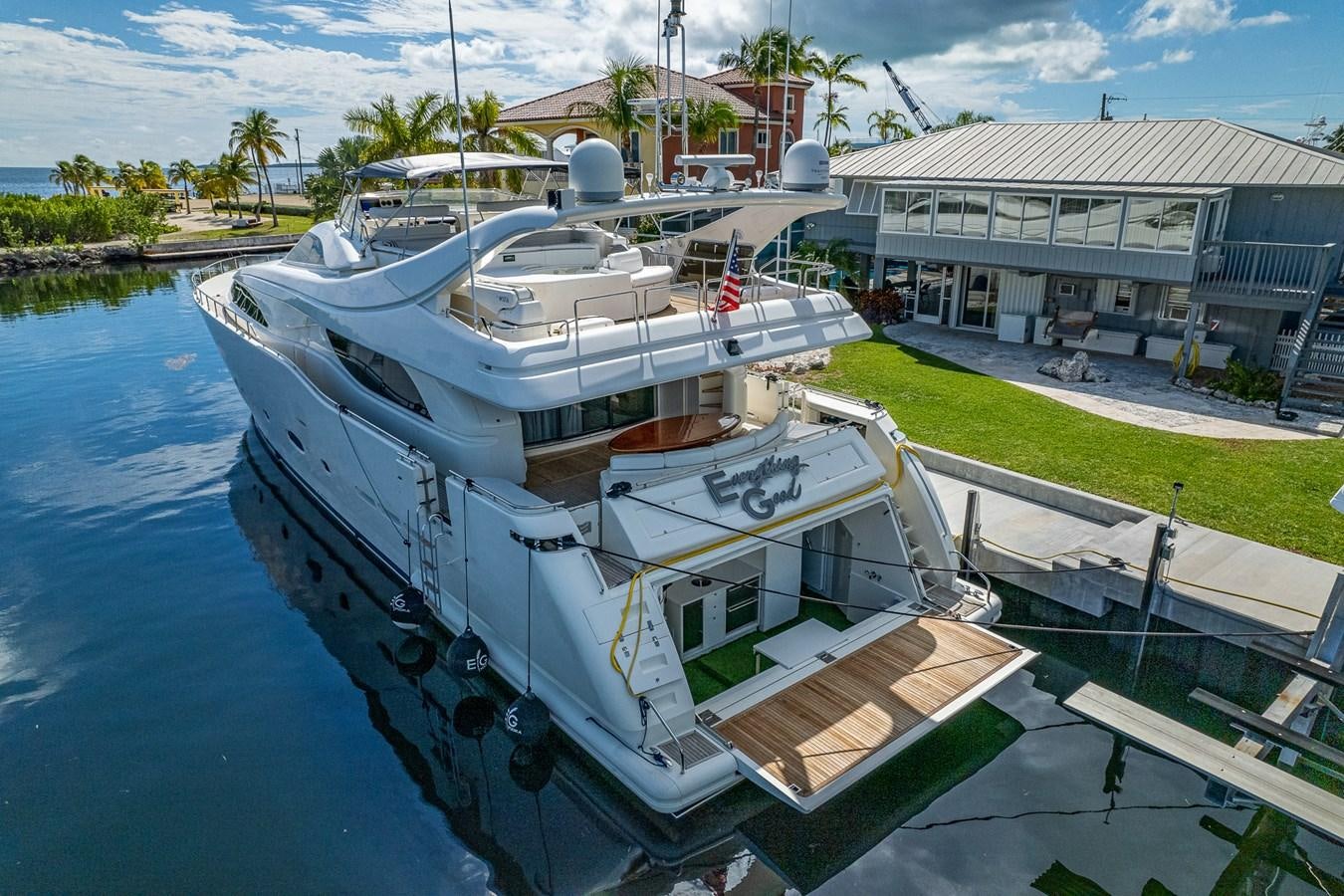 a boat docked at a pier aboard EVERYTHING GOOD Yacht for Sale