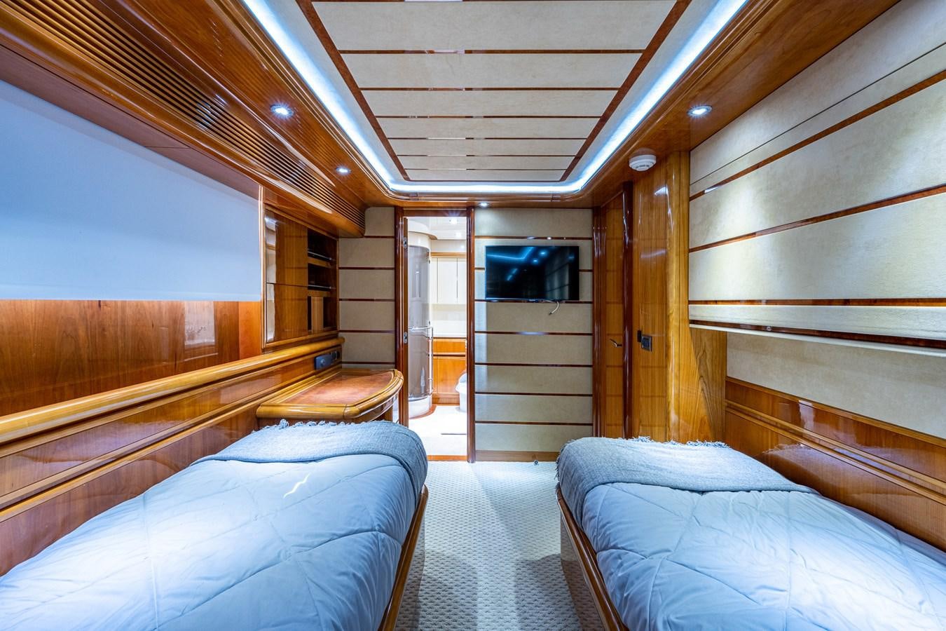 a cabin with beds aboard EVERYTHING GOOD Yacht for Sale