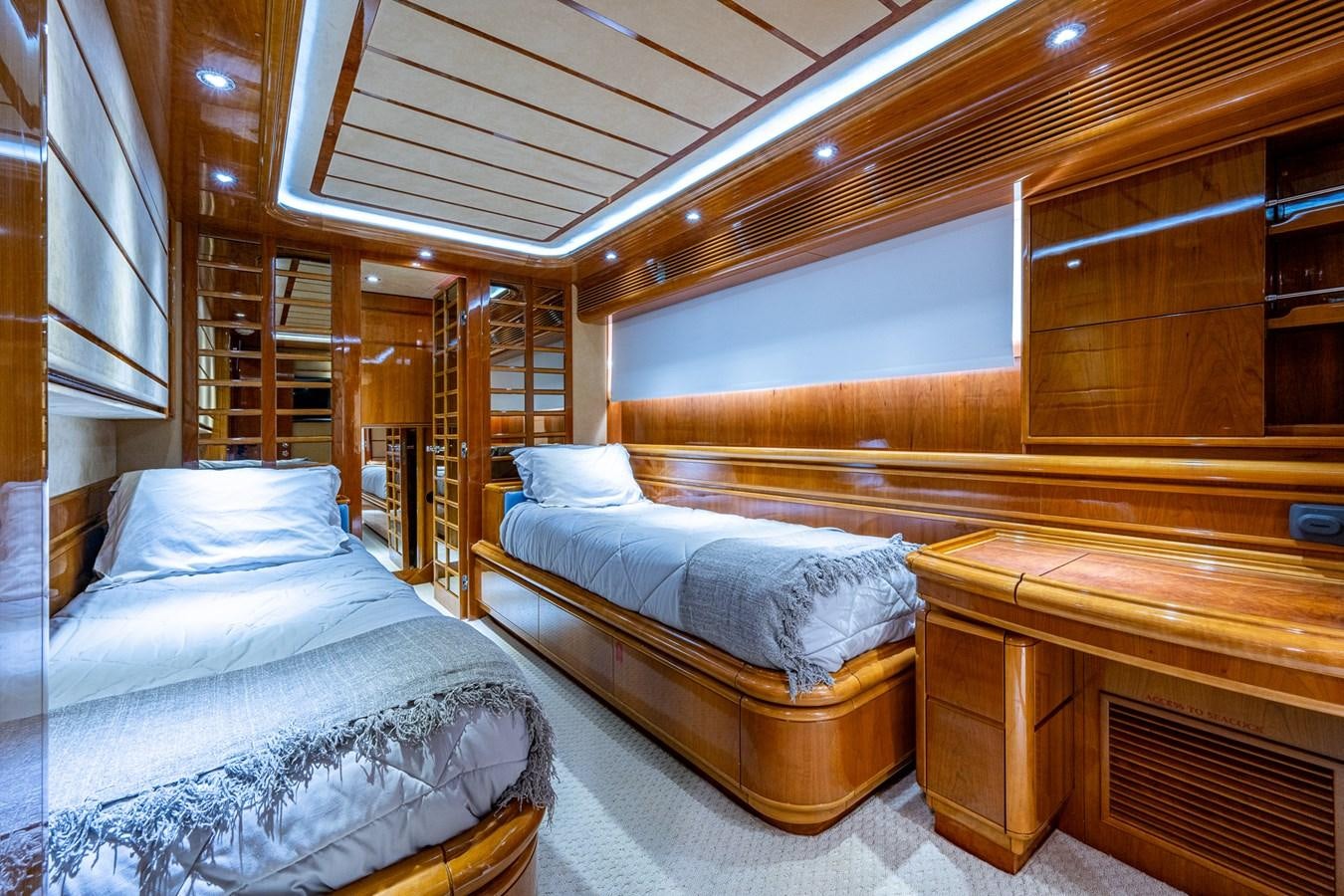 a room with bunk beds aboard EVERYTHING GOOD Yacht for Sale