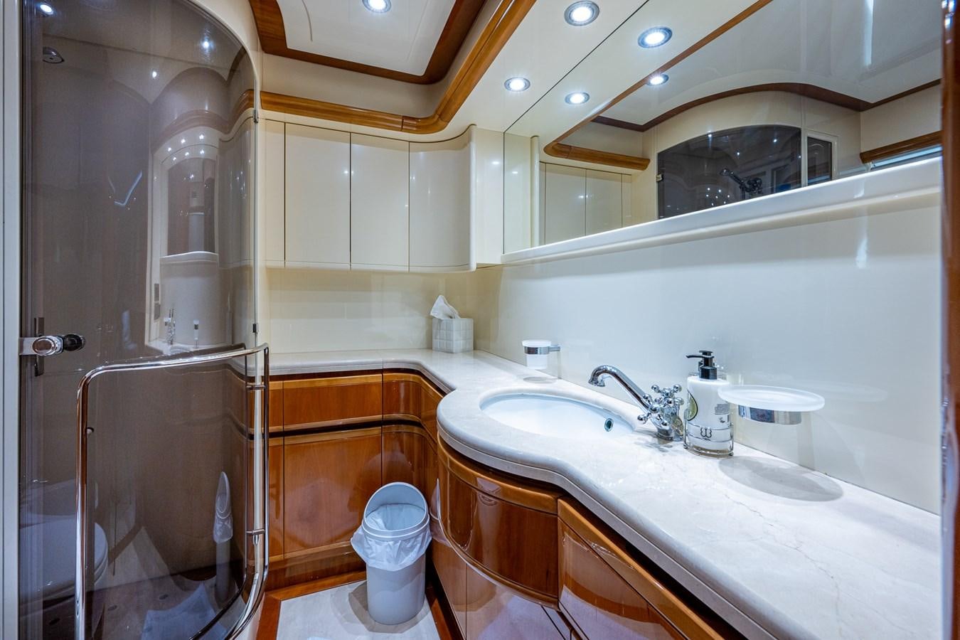 a bathroom with a sink and a shower aboard EVERYTHING GOOD Yacht for Sale