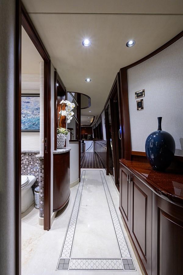 a bathroom with a glass shower aboard TIRELESS Yacht for Sale