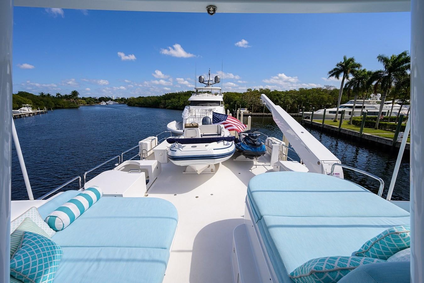 a group of boats on a body of water aboard TIRELESS Yacht for Sale