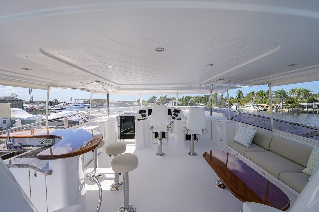 a room with a couch and chairs aboard TIRELESS Yacht for Sale