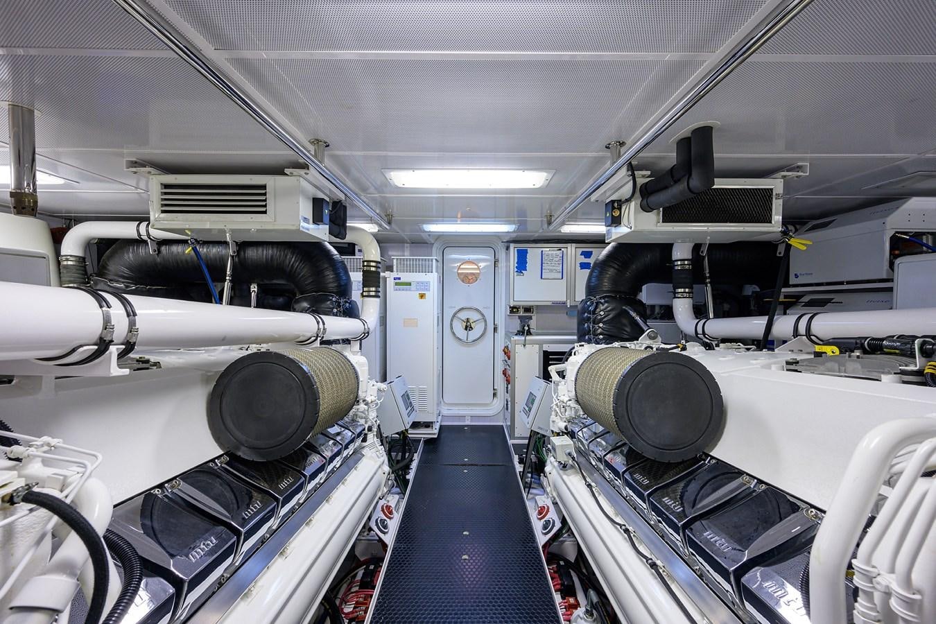a room with large machines aboard TIRELESS Yacht for Sale