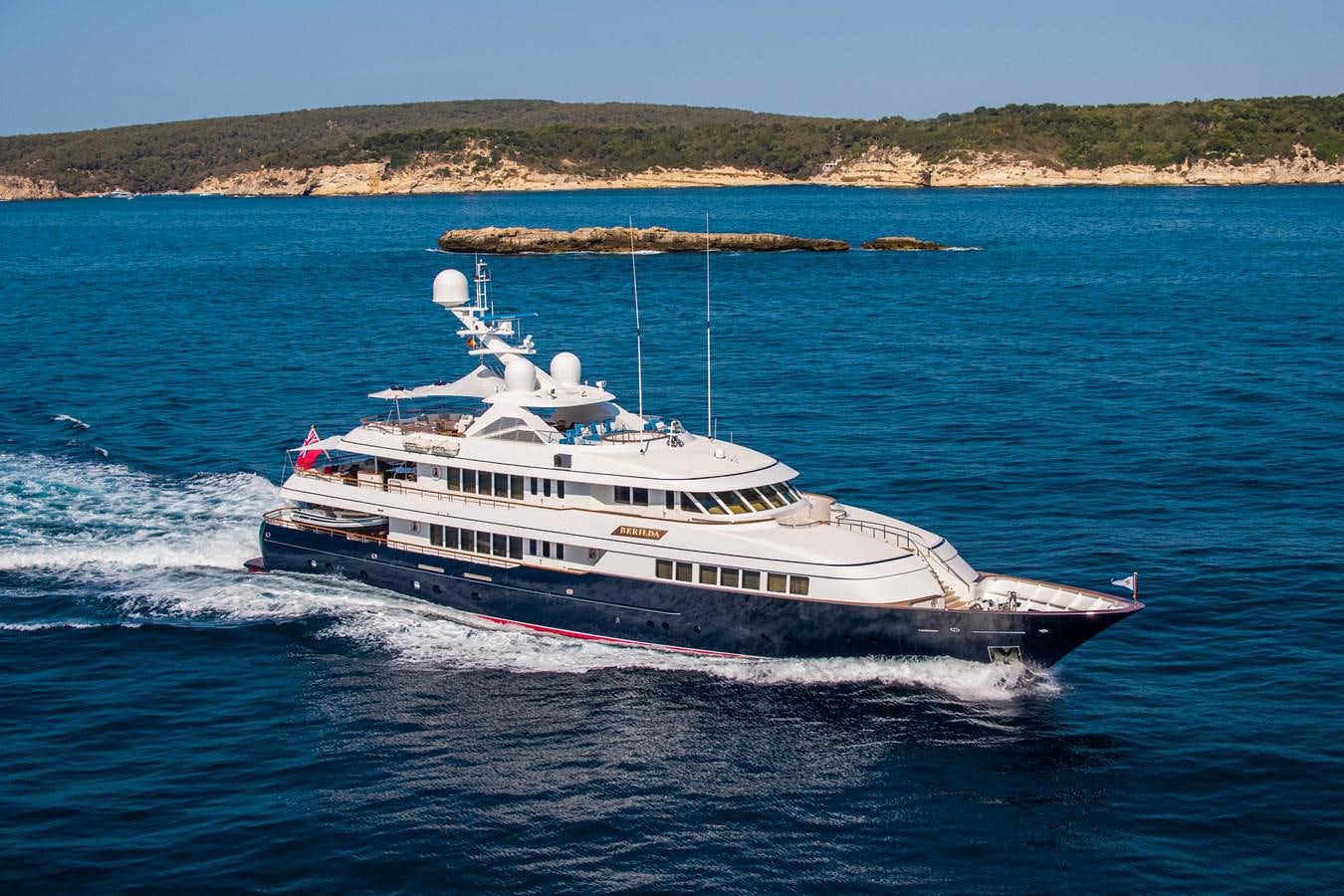 a large white boat on the water aboard BERILDA Yacht for Sale