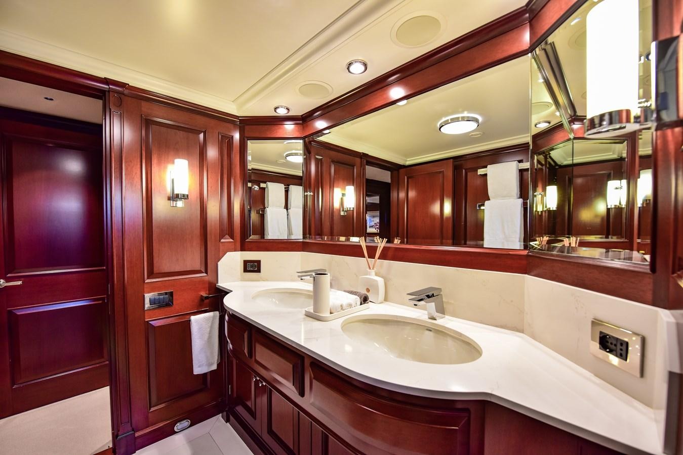 a bathroom with a large mirror aboard BERILDA Yacht for Sale