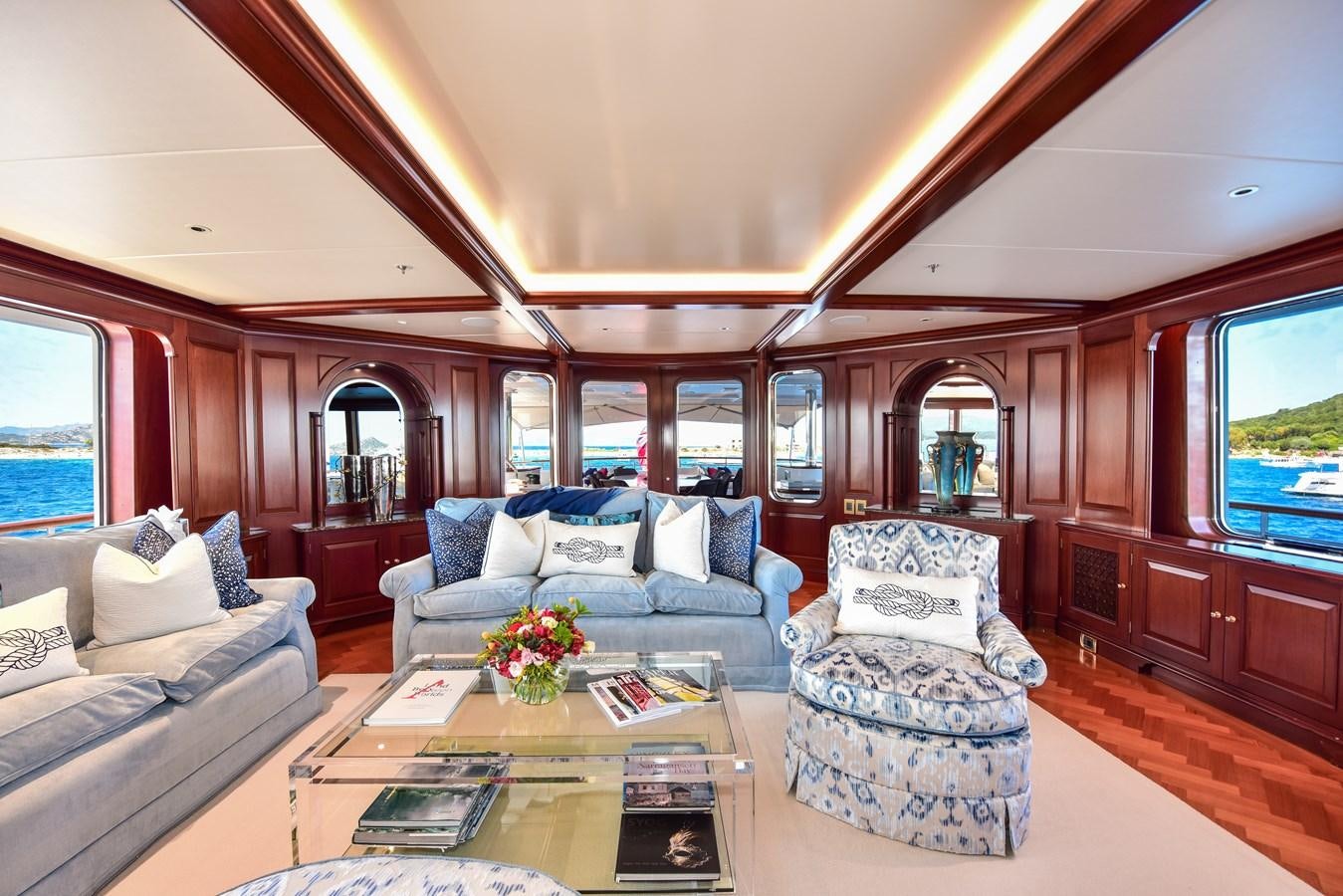 a living room with a large window aboard BERILDA Yacht for Sale