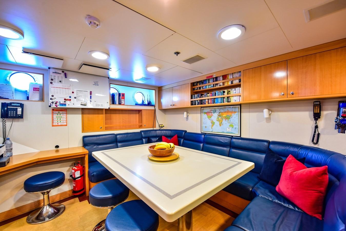 a room with a couch and a table and a couch aboard BERILDA Yacht for Sale