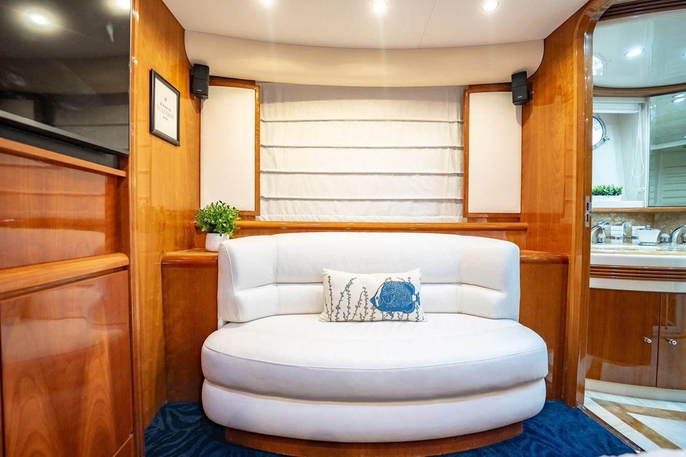 a bed in a room aboard GET WET Yacht for Sale