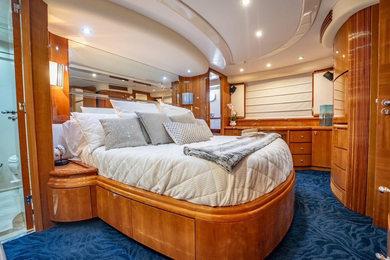 a bed in a room aboard GET WET Yacht for Sale