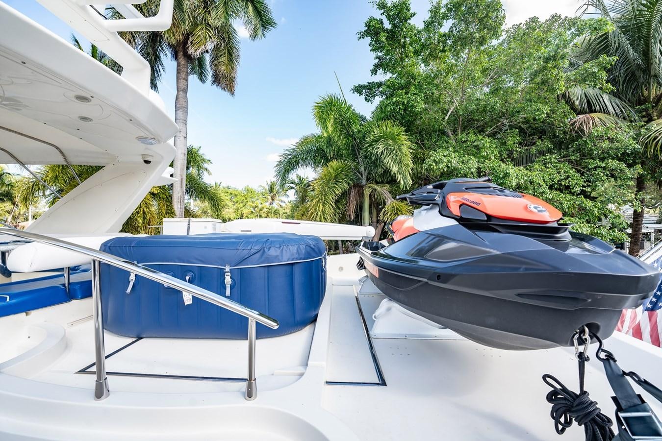 a couple of boats on a beach aboard GET WET Yacht for Sale