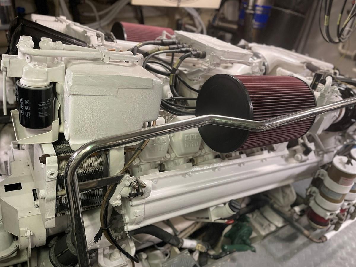 a car engine with a hood aboard GET WET Yacht for Sale