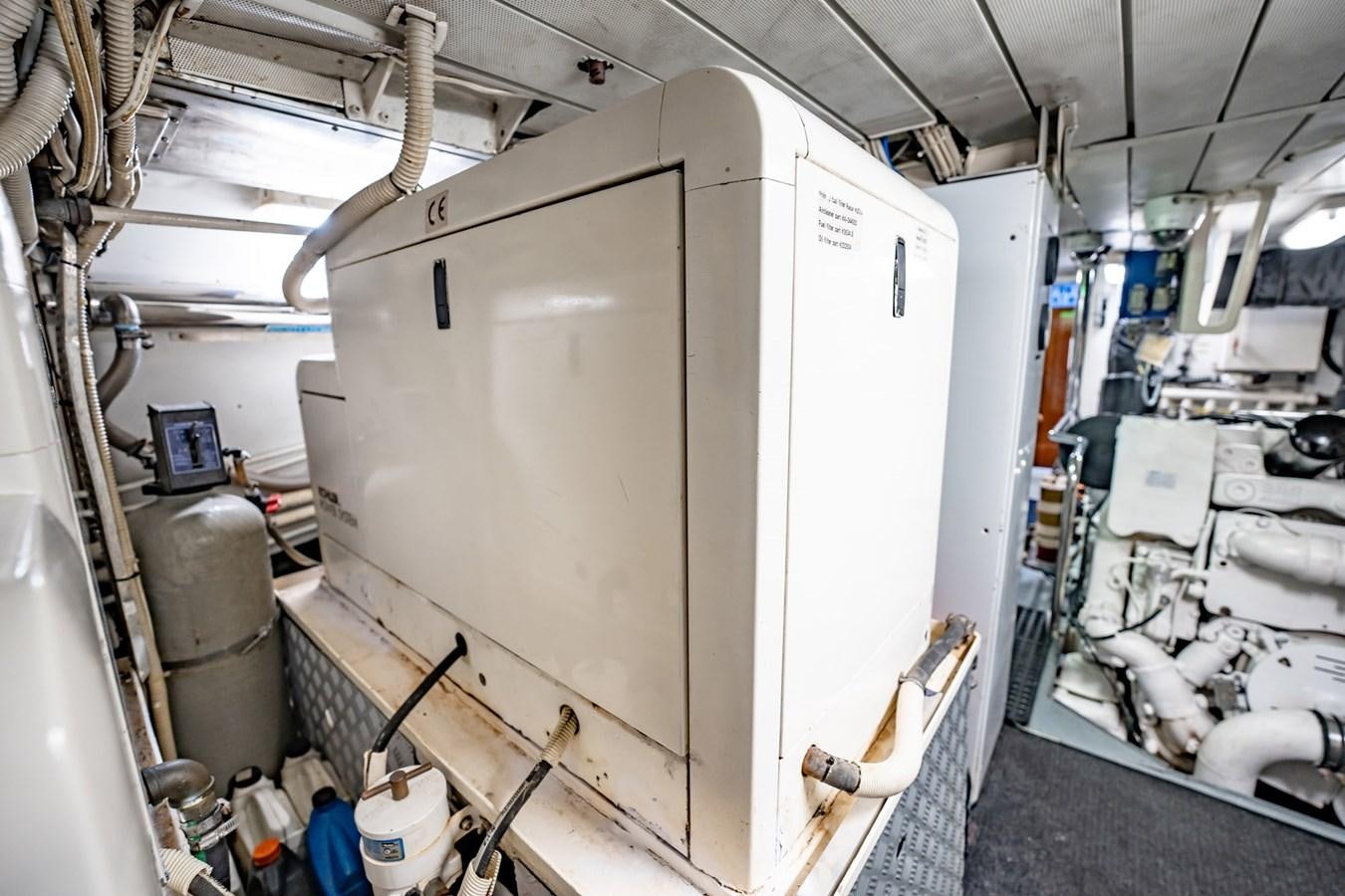 a large machine in a room aboard GET WET Yacht for Sale