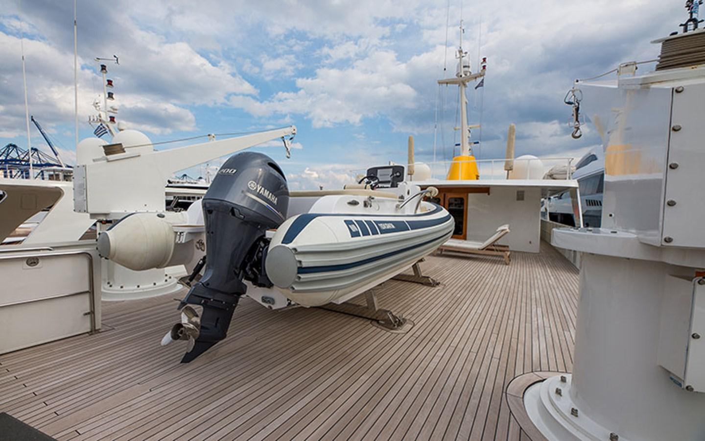 a boat on a deck aboard NOSTALGIA Yacht for Sale