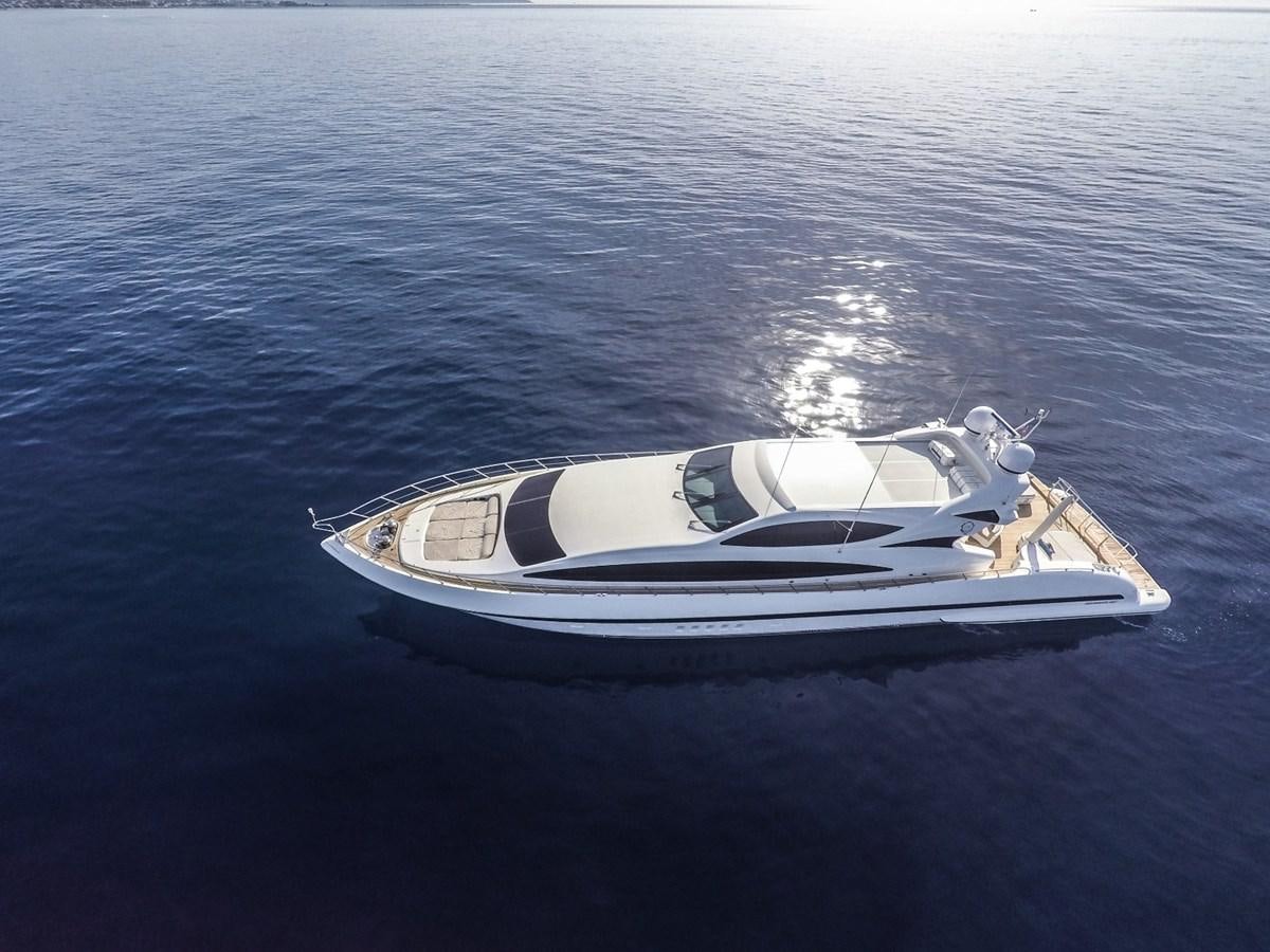a white and black boat on water aboard PHANTOM Yacht for Sale