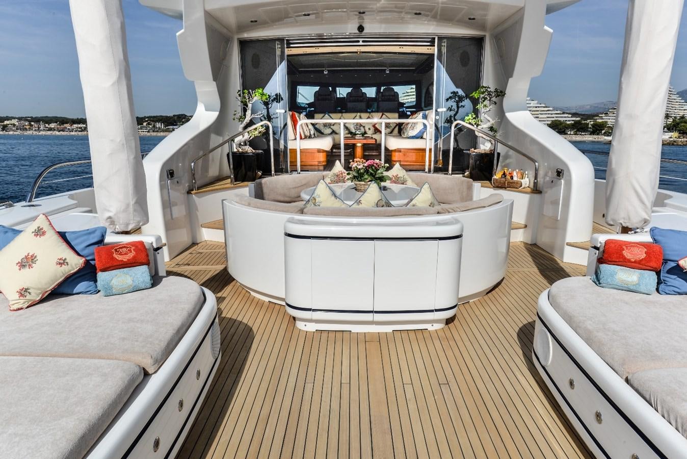 a boat with a table and chairs aboard PHANTOM Yacht for Sale