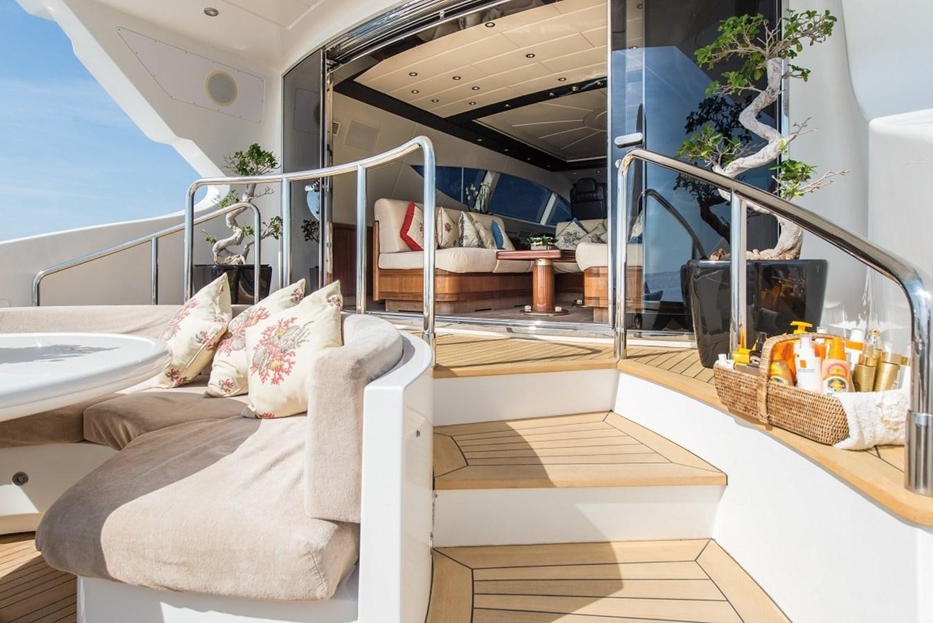 a bed on a balcony aboard PHANTOM Yacht for Sale
