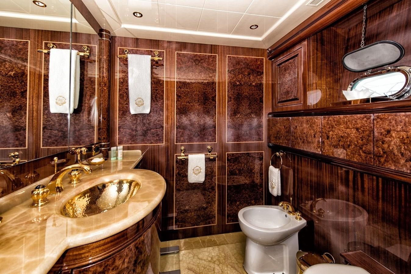 a bathroom with a sink and a toilet aboard PHANTOM Yacht for Sale