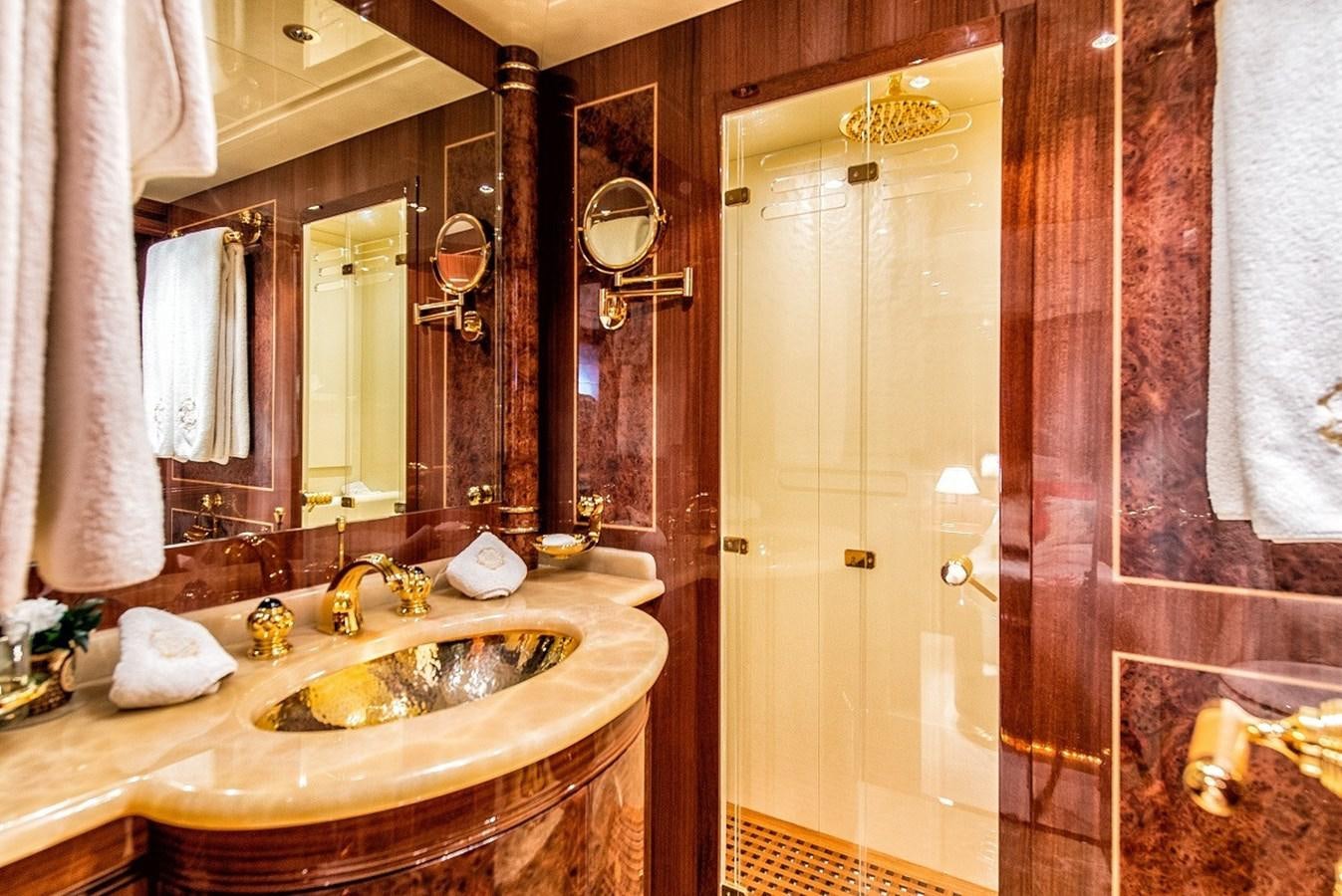 a bathroom with a sink and a shower aboard PHANTOM Yacht for Sale