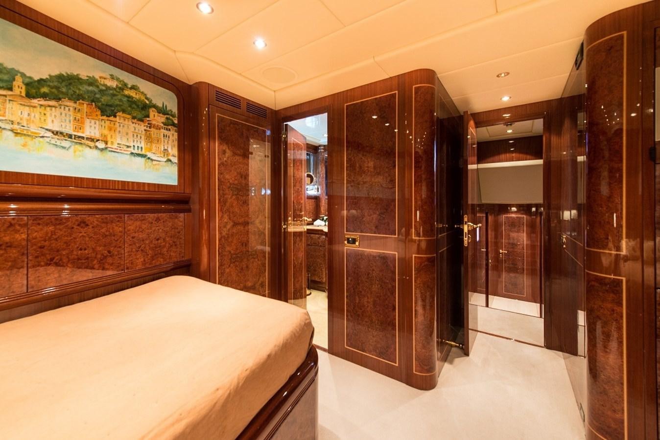 a room with a bed and a large closet aboard PHANTOM Yacht for Sale