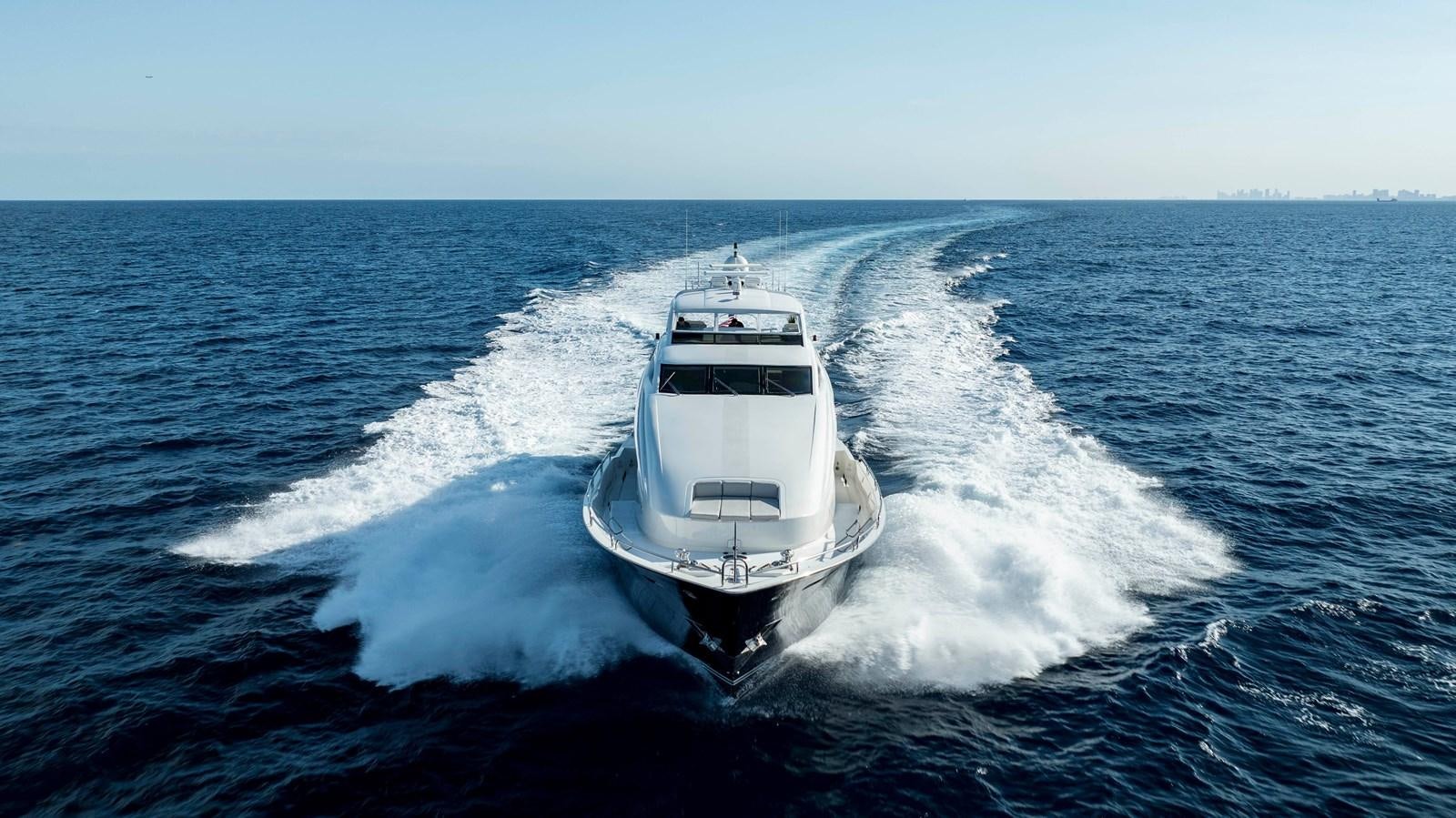 a boat on the water aboard LAZZARA 116 OPEN BRIDGE Yacht for Sale