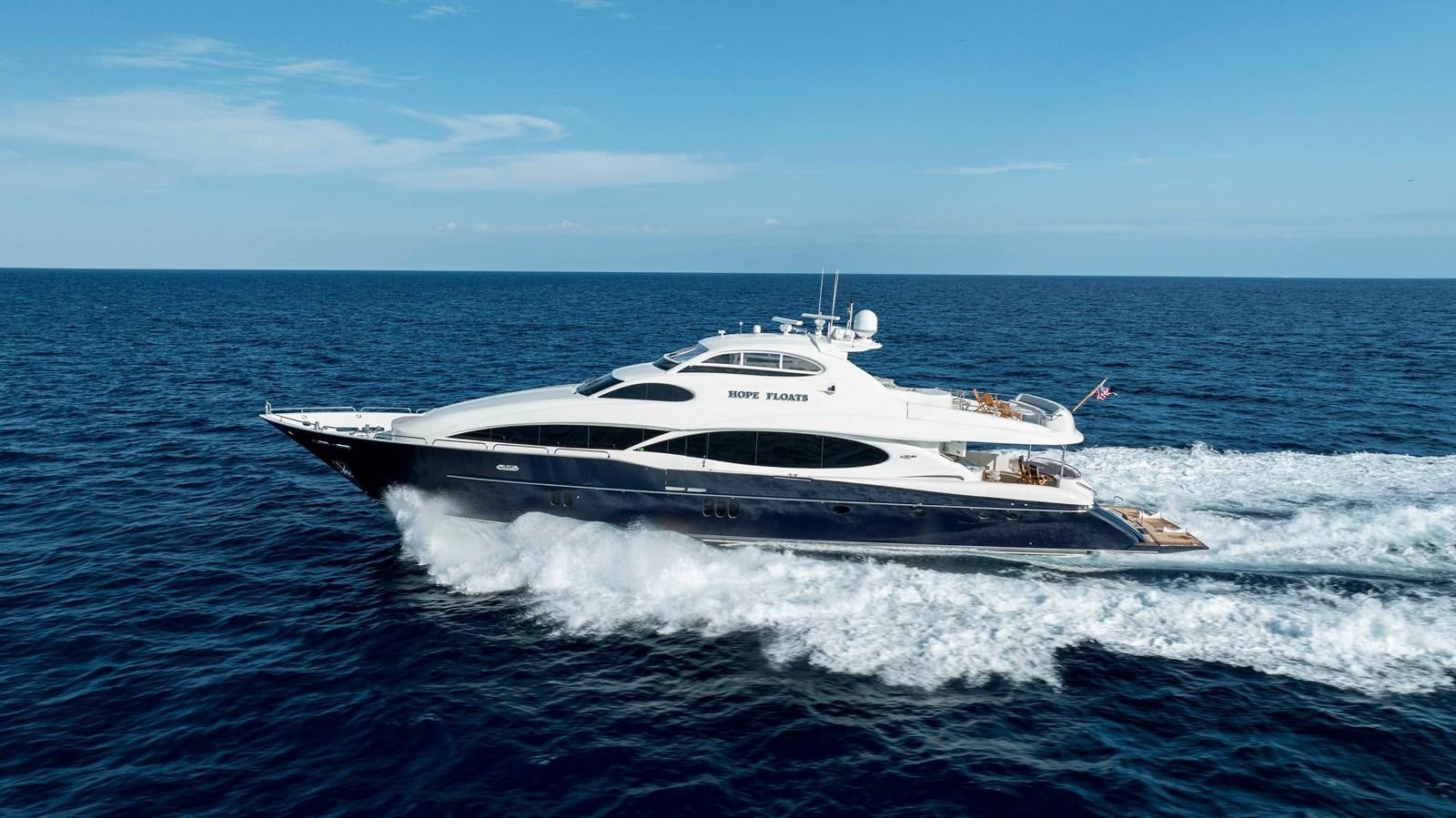 a white yacht in the water aboard LAZZARA 116 OPEN BRIDGE Yacht for Sale