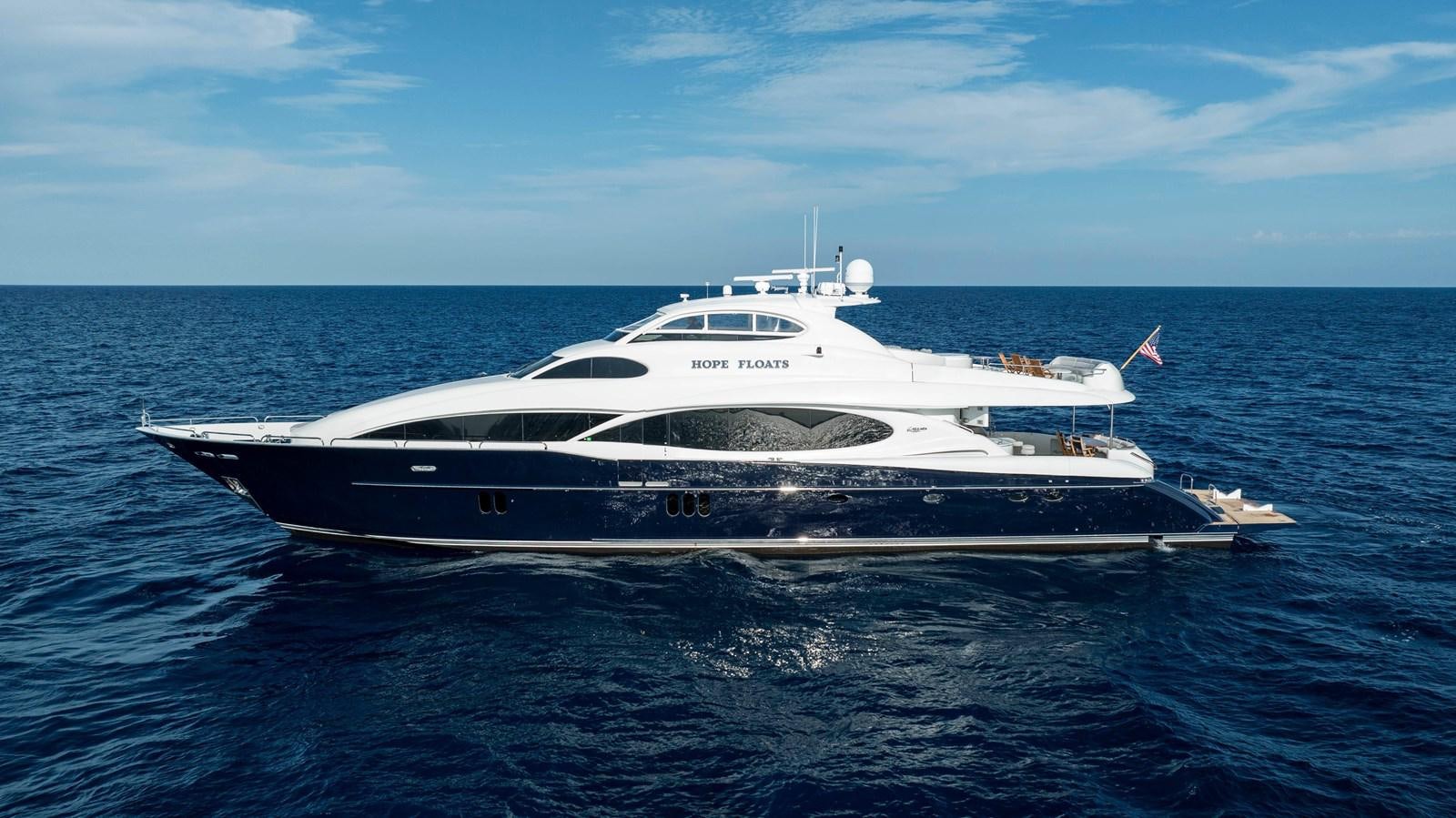 a white yacht in the water aboard LAZZARA 116 OPEN BRIDGE Yacht for Sale