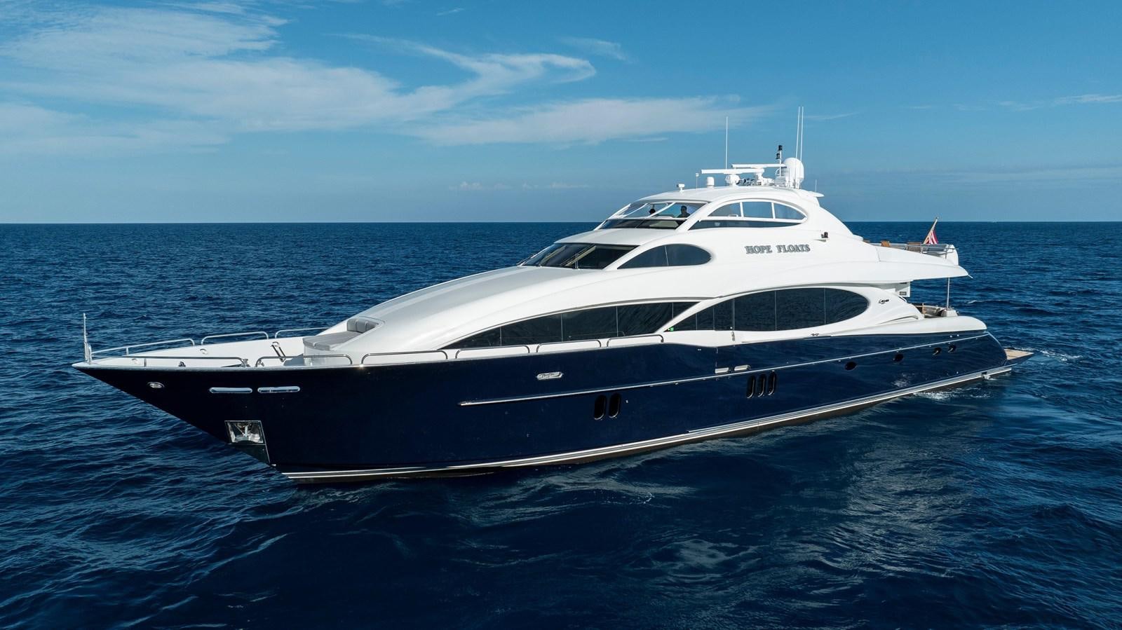 a white yacht in the water aboard LAZZARA 116 OPEN BRIDGE Yacht for Sale