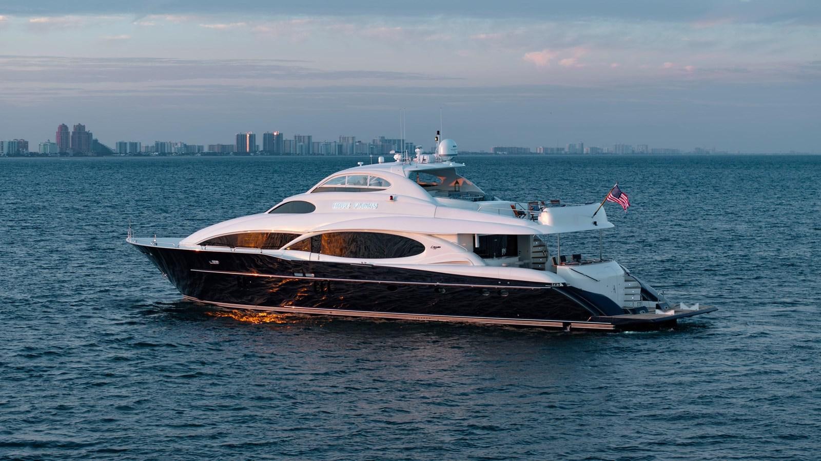 a boat in the water aboard LAZZARA 116 OPEN BRIDGE Yacht for Sale