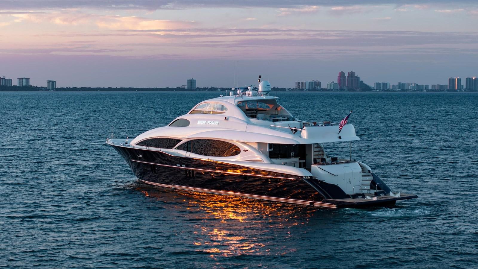 a boat on the water aboard LAZZARA 116 OPEN BRIDGE Yacht for Sale
