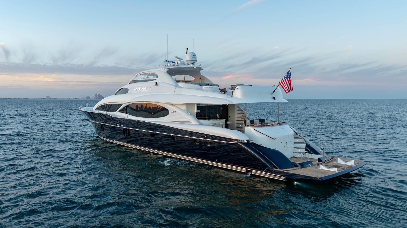 a boat in the water aboard LAZZARA 116 OPEN BRIDGE Yacht for Sale