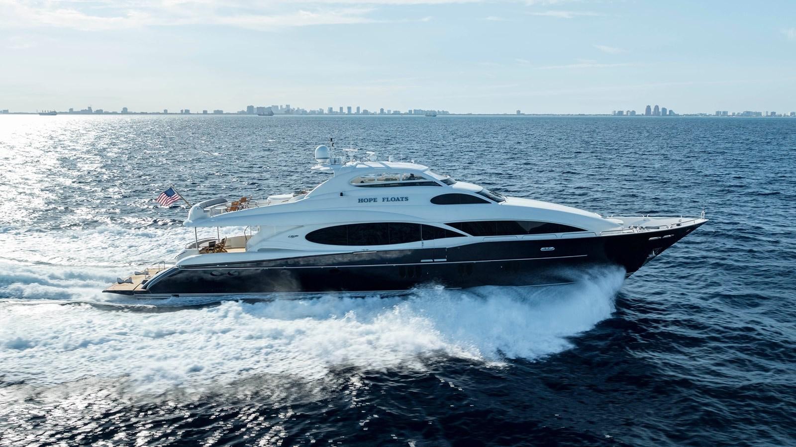 a boat on the water aboard LAZZARA 116 OPEN BRIDGE Yacht for Sale