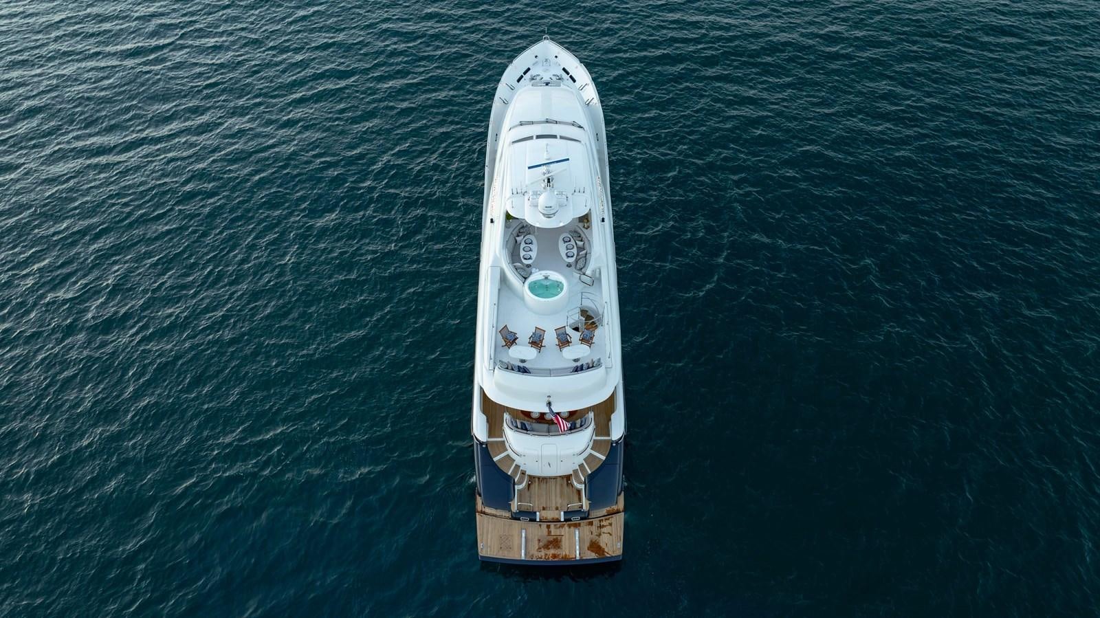 a small white boat aboard LAZZARA 116 OPEN BRIDGE Yacht for Sale