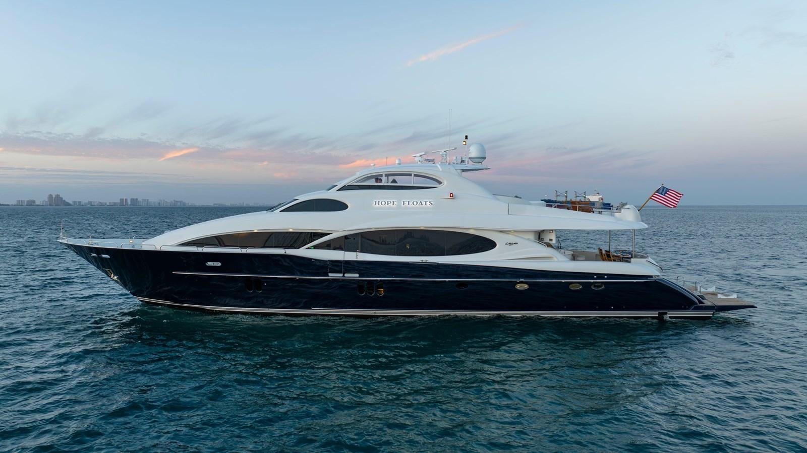 a boat on the water aboard LAZZARA 116 OPEN BRIDGE Yacht for Sale