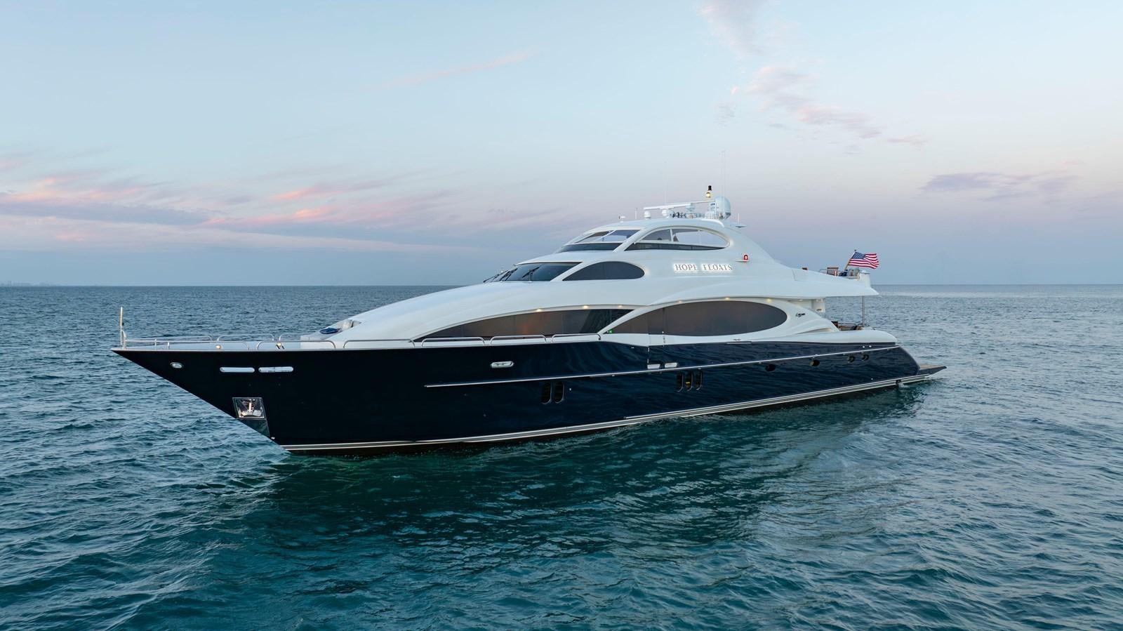 a boat on the water aboard LAZZARA 116 OPEN BRIDGE Yacht for Sale