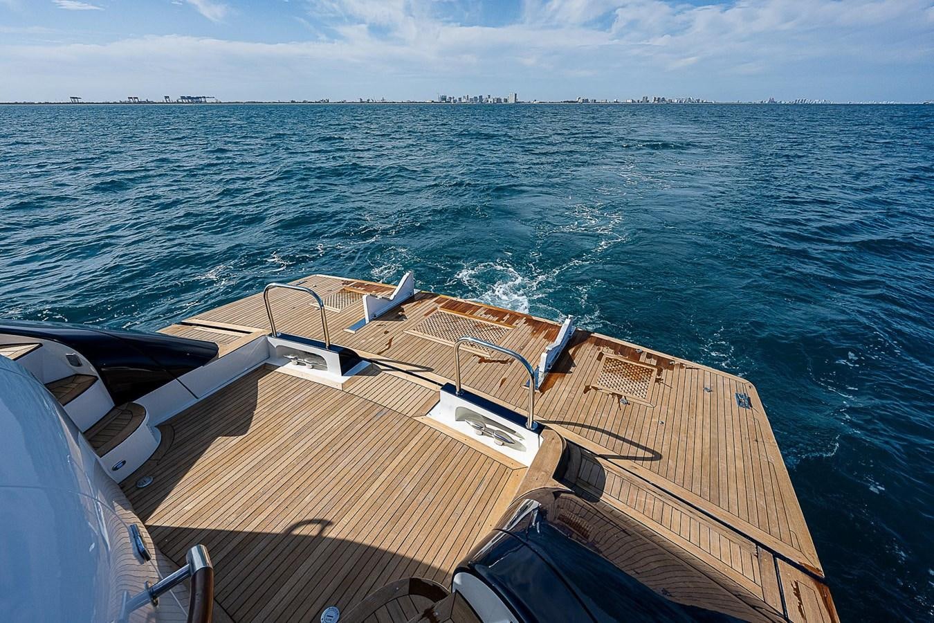 a boat on the water aboard LAZZARA 116 OPEN BRIDGE Yacht for Sale