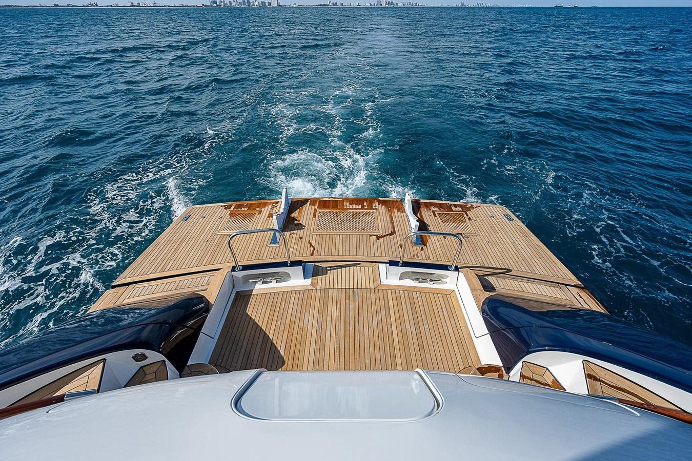a boat on the water aboard LAZZARA 116 OPEN BRIDGE Yacht for Sale