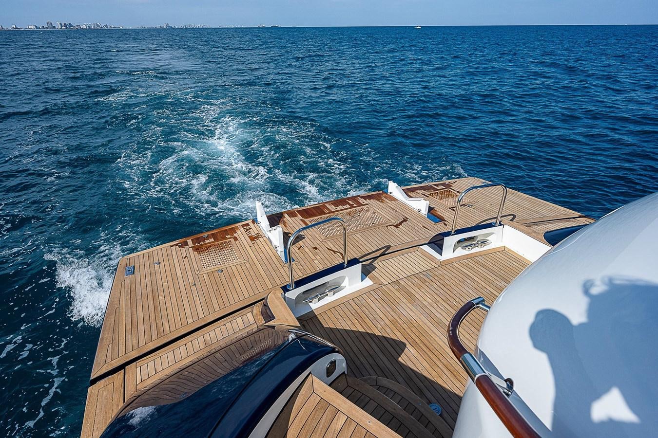 a boat on the water aboard LAZZARA 116 OPEN BRIDGE Yacht for Sale