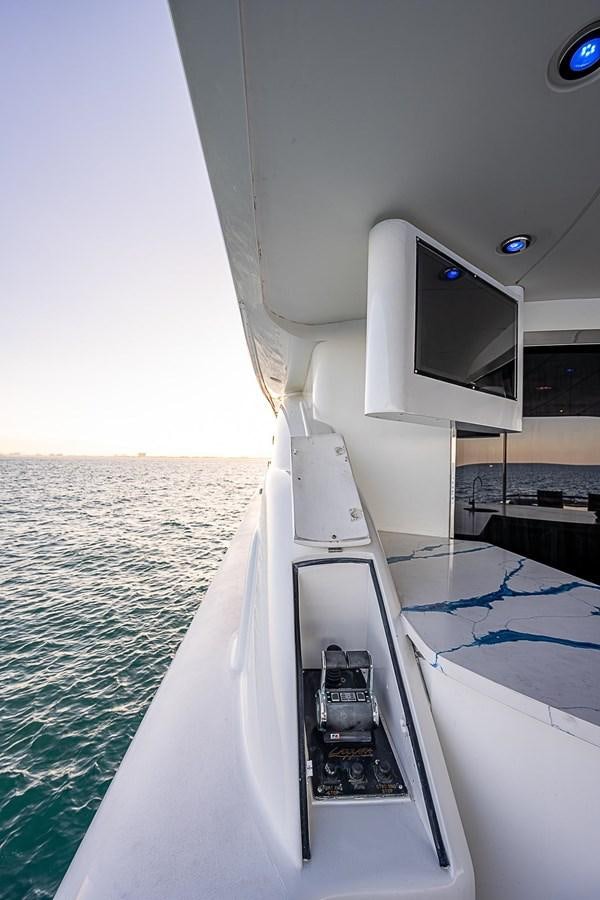 a boat on the water aboard LAZZARA 116 OPEN BRIDGE Yacht for Sale