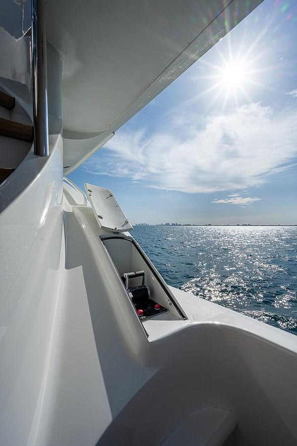a boat on the water aboard LAZZARA 116 OPEN BRIDGE Yacht for Sale