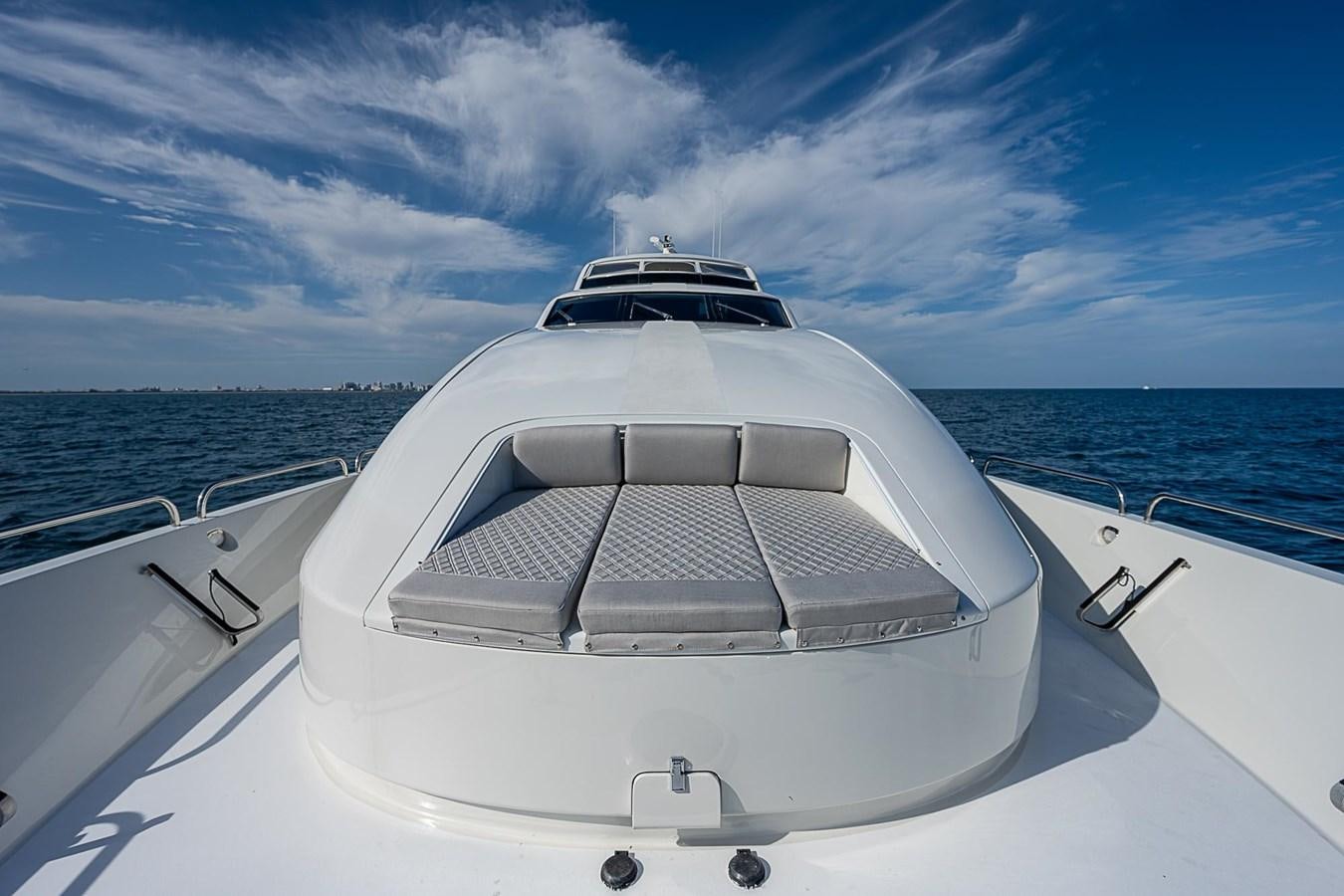 a boat on the water aboard LAZZARA 116 OPEN BRIDGE Yacht for Sale
