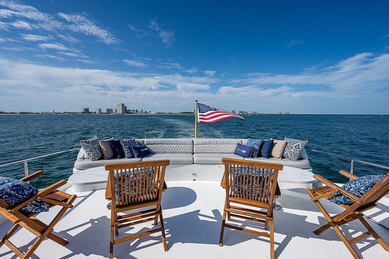 chairs on a beach aboard LAZZARA 116 OPEN BRIDGE Yacht for Sale