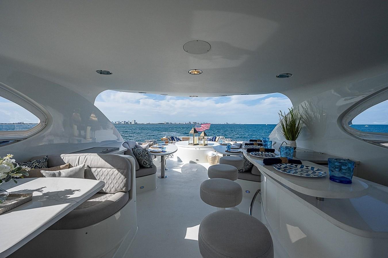 a room with a view of the ocean and the ocean aboard LAZZARA 116 OPEN BRIDGE Yacht for Sale