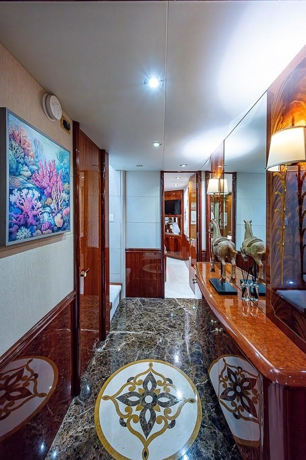 a large bathroom with a marble countertop aboard LAZZARA 116 OPEN BRIDGE Yacht for Sale